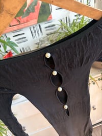 Image 1 of NWT black pearl  body suit 