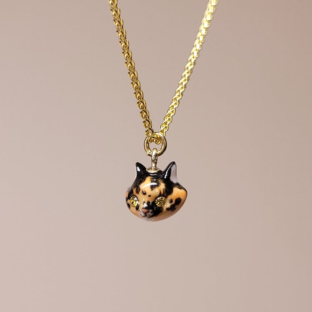 Image of Tortoiseshell Porcelain & Gold Vermeil Teeny Tiny Cat Pendant