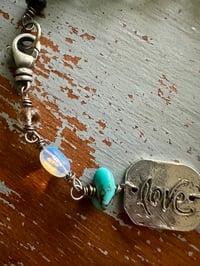 Image 15 of faceted gemstone and sterling silver medallion bracelet