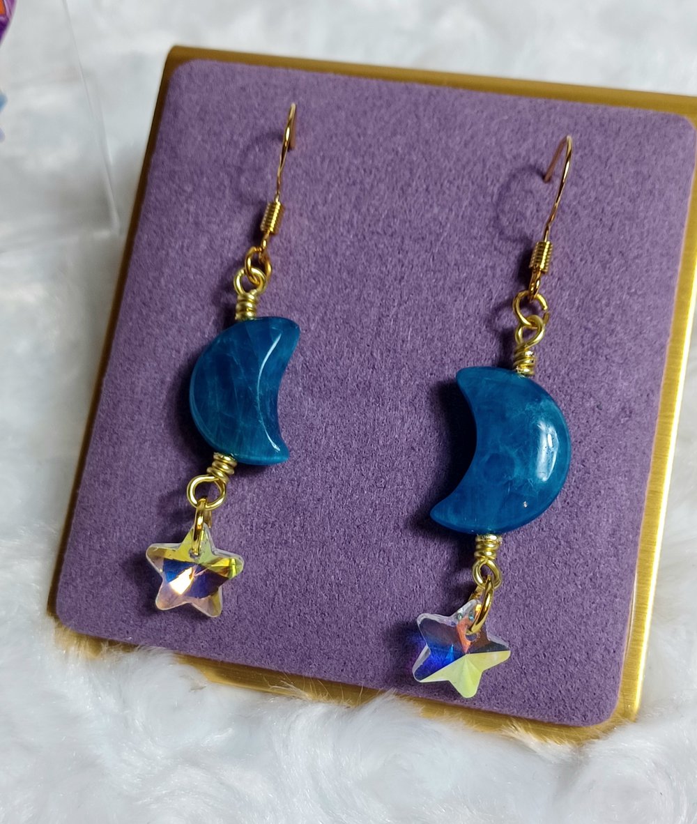 Image of Carved crystal moon earrings 