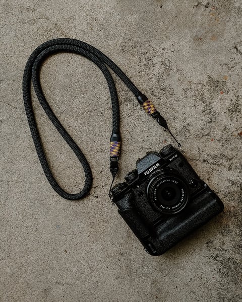 Image of Black rope shoulder strap w/ optech qd mini loop attachments