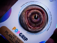 Image 1 of Custom Swappable Phone Grip for smartphones, reflective pupil, green glow in the dark