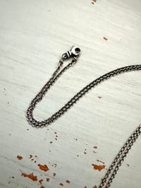 Image 8 of sapphire pendant with hand engraved Shakespeare quote