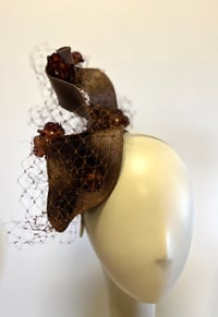 Image 1 of Brown headpiece