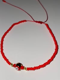 Image 2 of Red/gold evil eye bracelet 