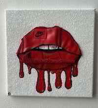 Image 1 of Kiss