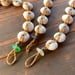 Image of Mermaid friendly puka shell bracelet with locking seaglass clasp