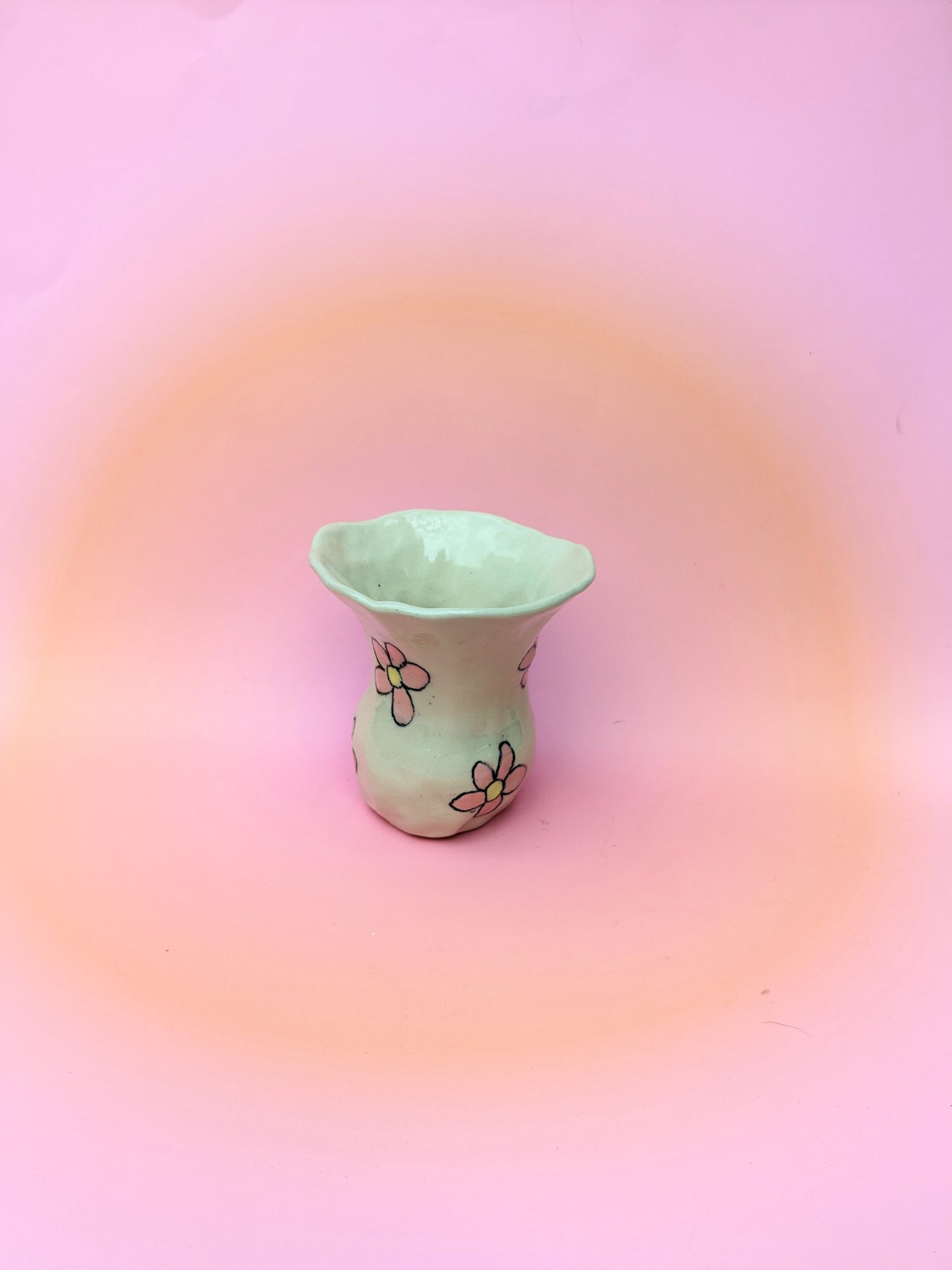 Image of pink and yellow daisy vase