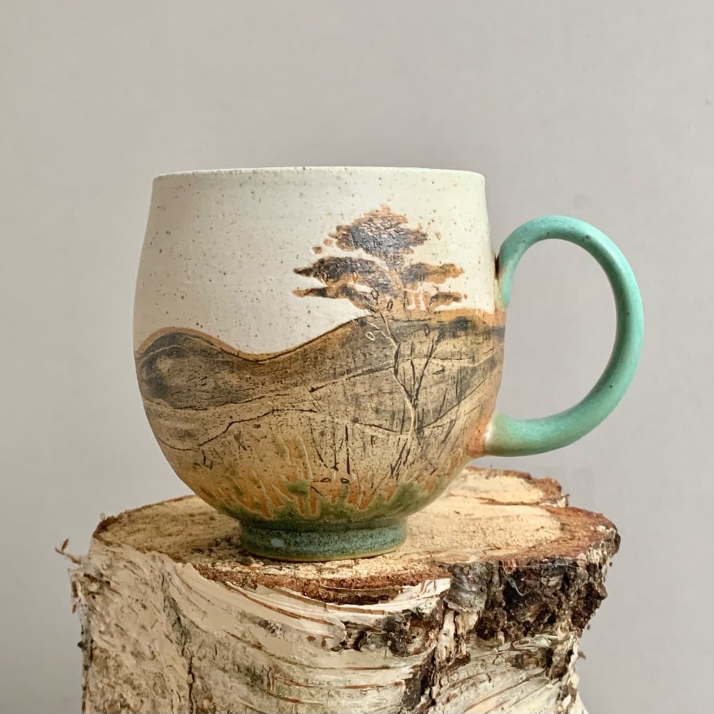 Image of Cup with trees 