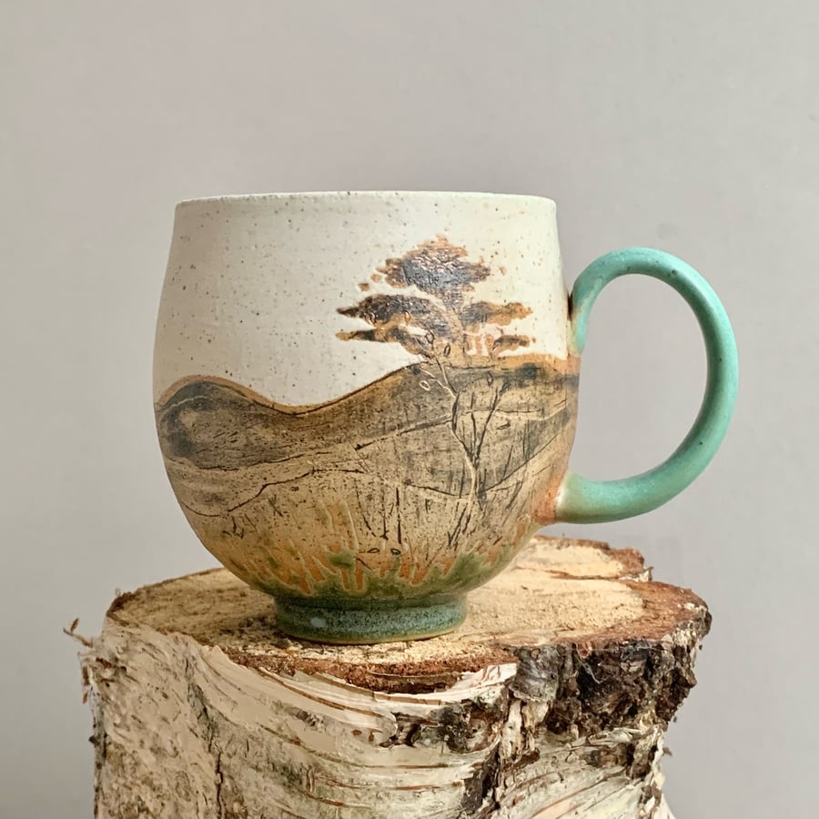 Image of Cup with trees 