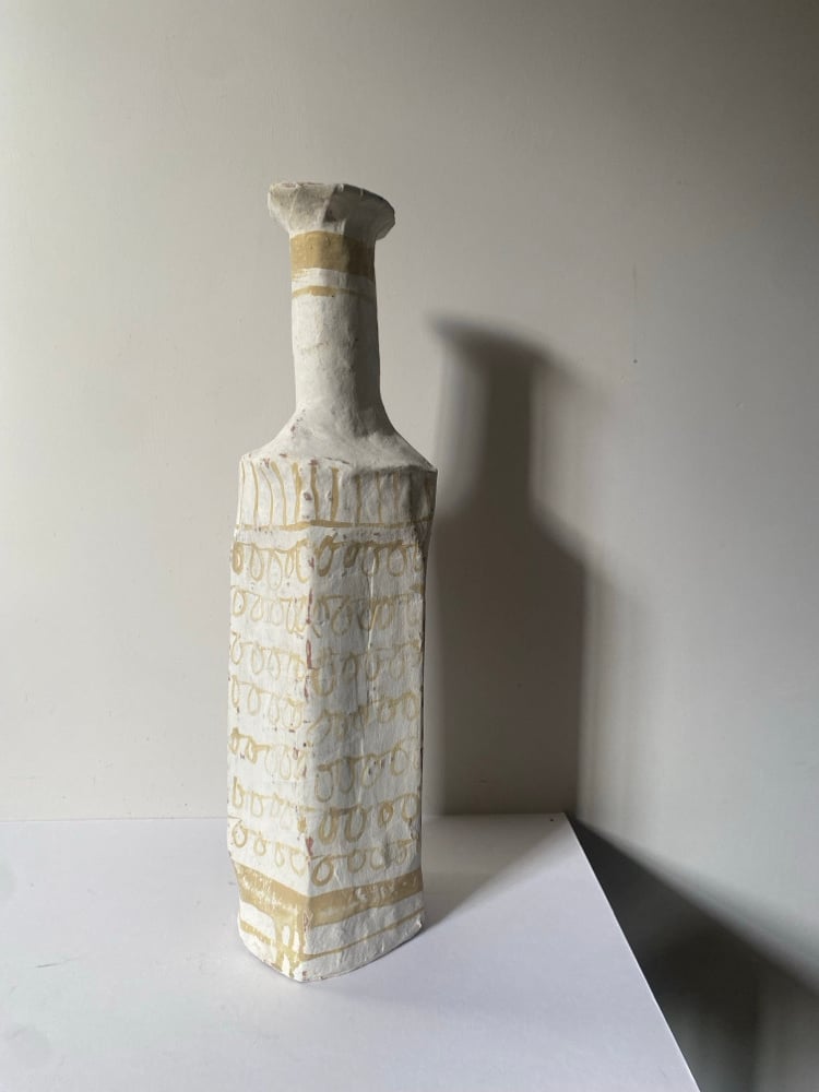 Tall faceted  Paper Bottle