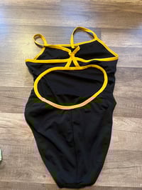 Image 1 of  black and yellow sport swimsuit 
