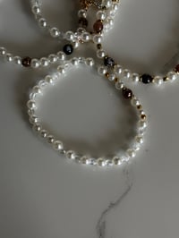 Image 8 of Starlight Shimmer | Cream and Gold  Tumbler Bracelet Stack