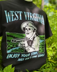 Image 2 of Black “Enjoy Your Stay” Tee