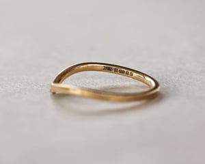 Image of 18ct yellow gold 1.5mm milled edge wishbone ring