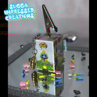 Image 4 of Grumpy Bear Chick Funko Pop Clip