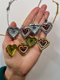 Image 1 of Worm Lockets