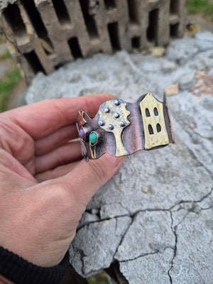 Copper bracelet with trees, houses, cat and star