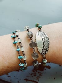 Image 1 of beaded turquoise and sterling silver charm bracelet . home is with you quote bracelet