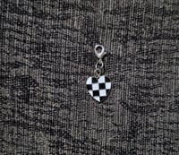 Checkered heart charm