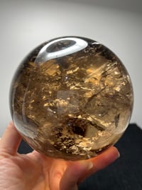 Image 12 of Golden Rutile In Smoky Quartz Sphere #1770