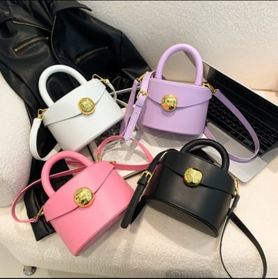 Image of  Bucket solid rock hand bags 