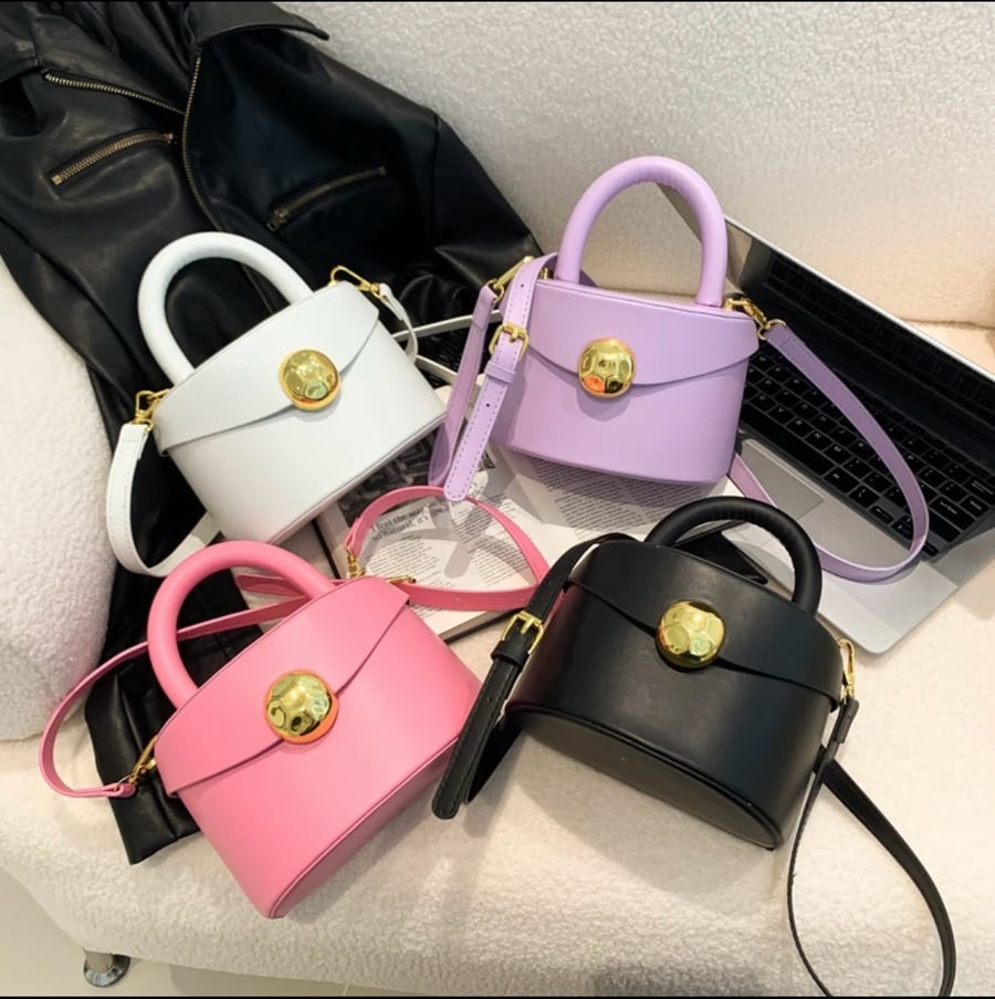 Image of  Bucket solid rock hand bags 