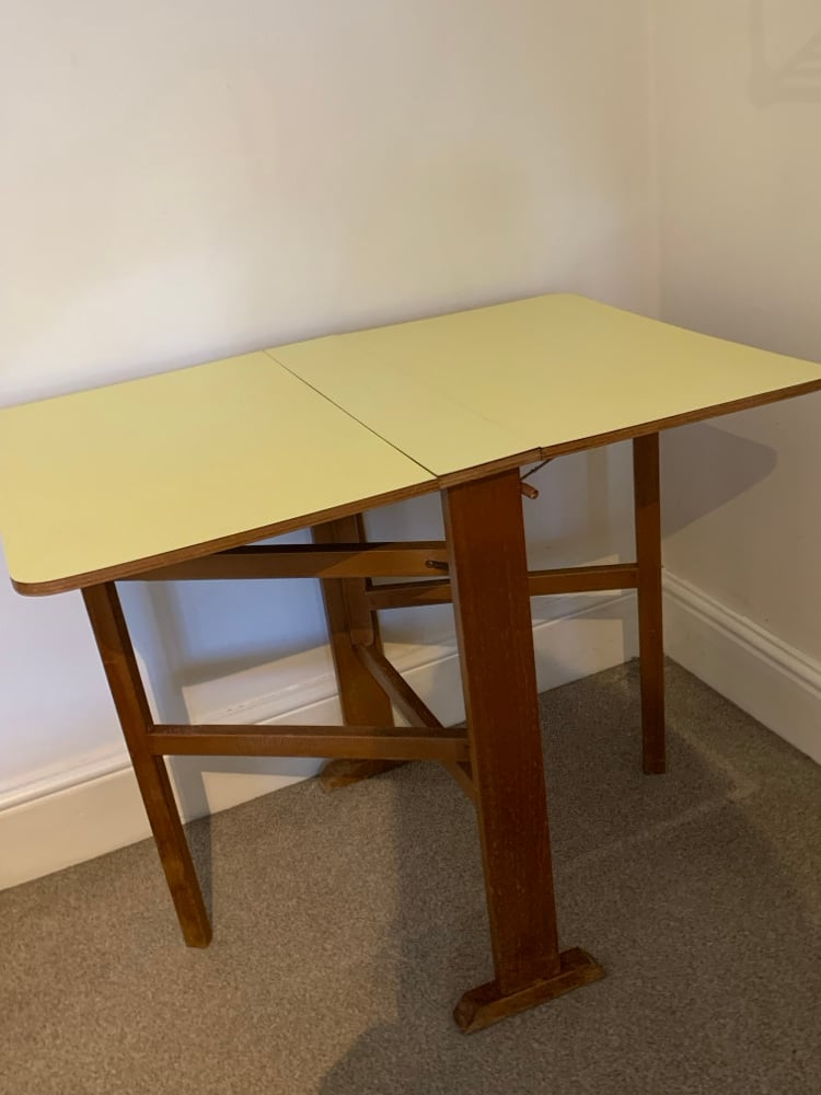 Image of Dropleaf Yellow Formica Table