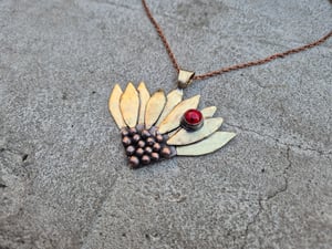 Sunflower pendant with ladybug 