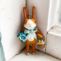 Image 2 of Brown Dutch Rabbit with Basket of Eggs and Florals