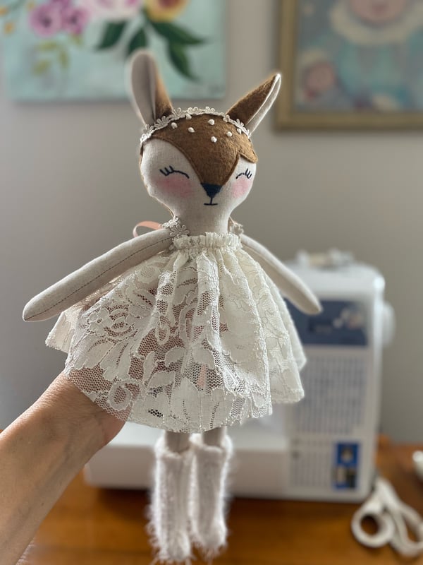 Image of Fawn, A Petite Deer, With Pink Dress And Heart Purse
