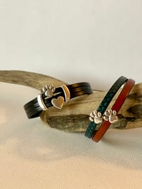 Image 1 of Yellow Paws 