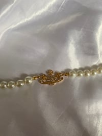 Image 1 of Gold orb pearl bracelet