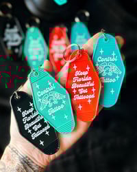 Image 1 of Florida motel keychains