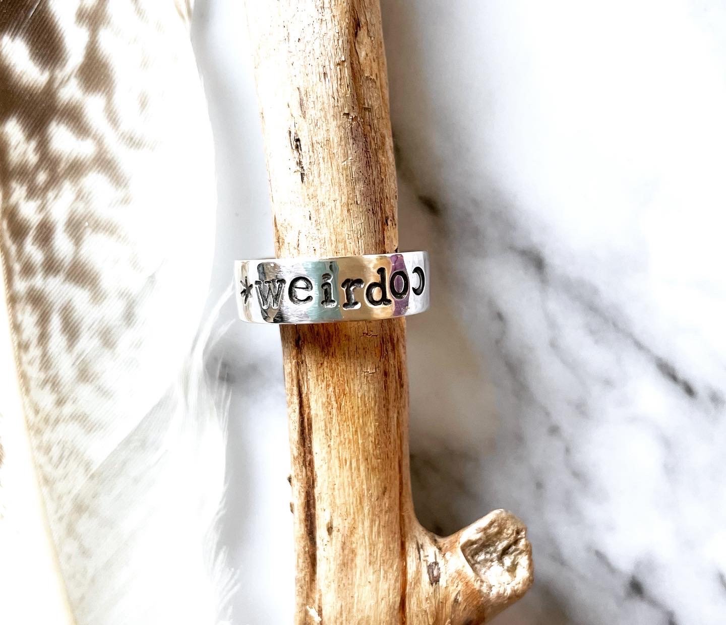 Image of Weirdo silver ring with star and moon stamp. Hand stamped silver 925 ring.