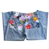 Image 1 of Patchwork Floral Levi’s 