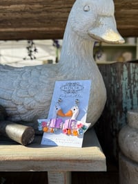 Image 1 of Geese Reading 