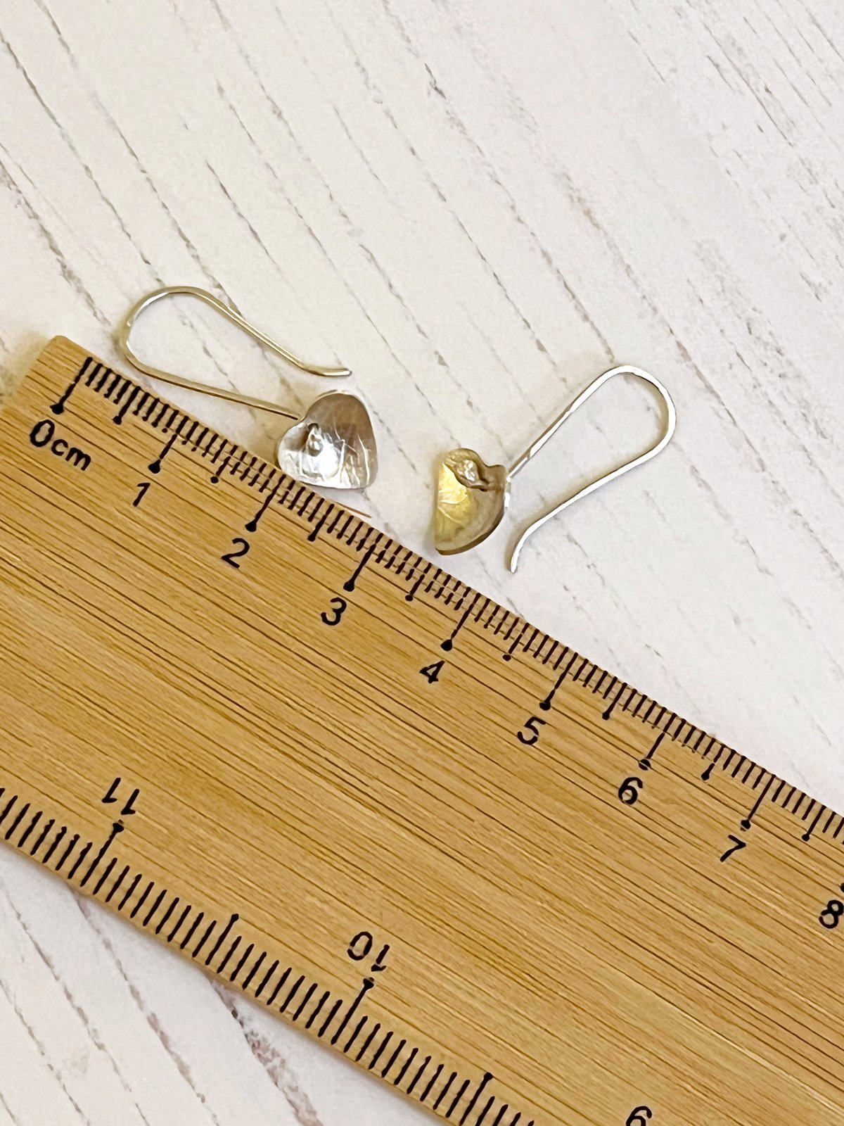 Image of Recycled sterling silver heart drop earrings.