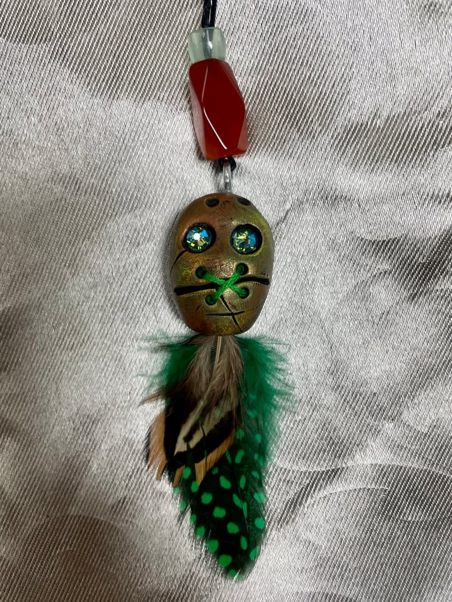 Lucky Shrunken Head- swamp water