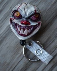 Image 7 of Handmade Pennywise Badge Reel Keychain 