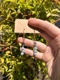 “tidal” earrings