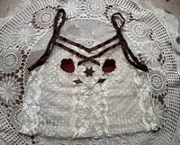 Image 1 of white lace with flowers