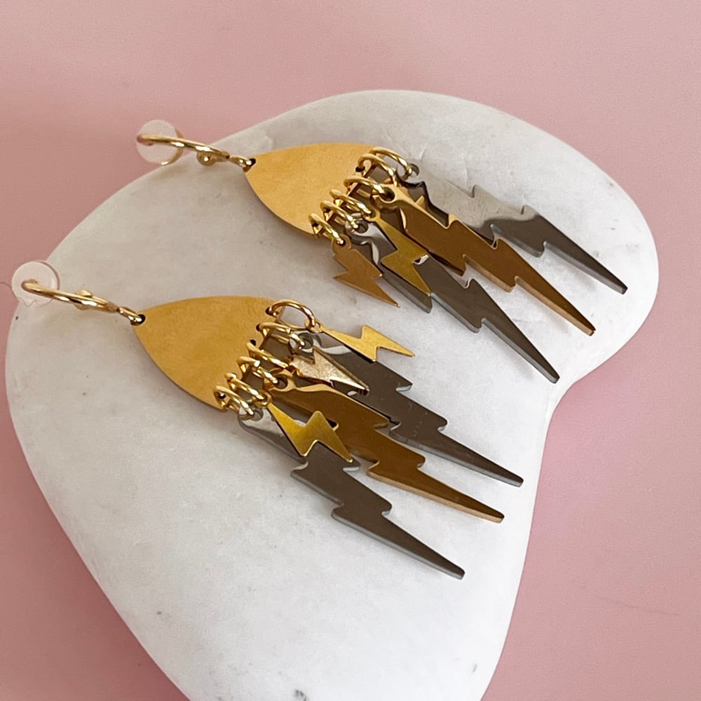 Image of Gold and Silver Lightning Bolts
