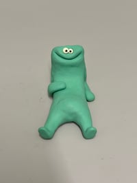 Image 3 of happy relaxed green thing