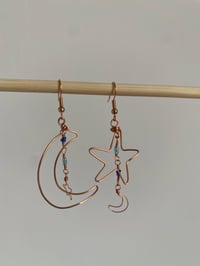 Image 1 of Asymmetrical moon and star earrings