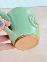 Image 5 of Yoni Emblem Mug in Green (No. 01)