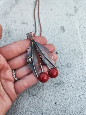 Cherry pendant with ladybug 