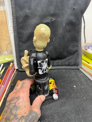 Image of Graf Can Man sculpture by DL