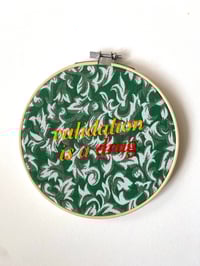 Image 1 of Original Embroidery Artwork - Validation (Orange/Green Print)