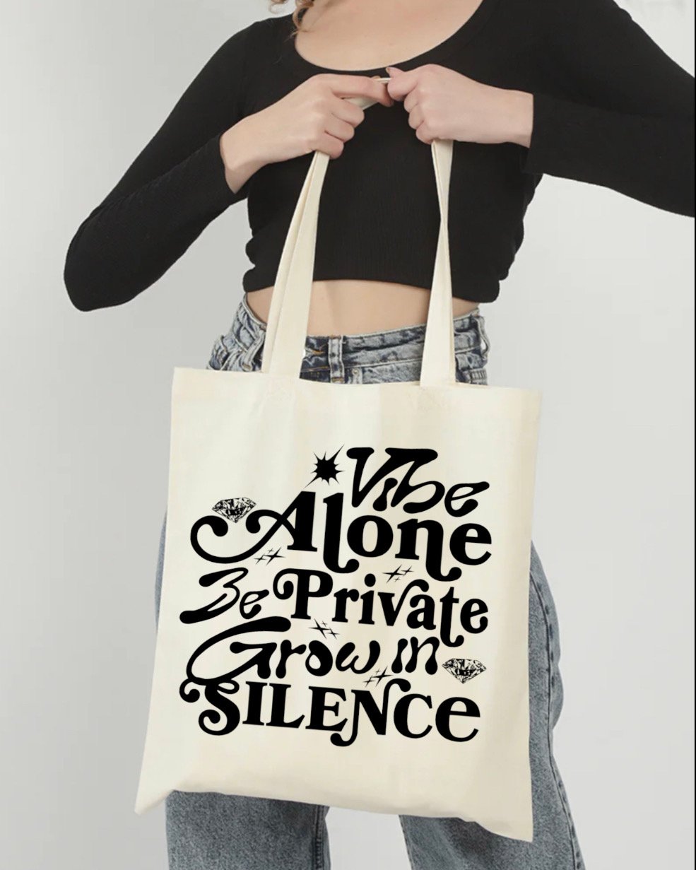 Vibe alone tote bag